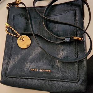Marc Jacob's purse with a long strap adjustable